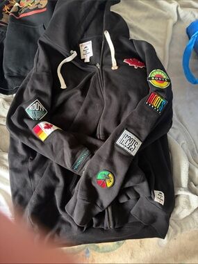 Roots  men’s Black Zip Hoodie with Colorful Canada Patches